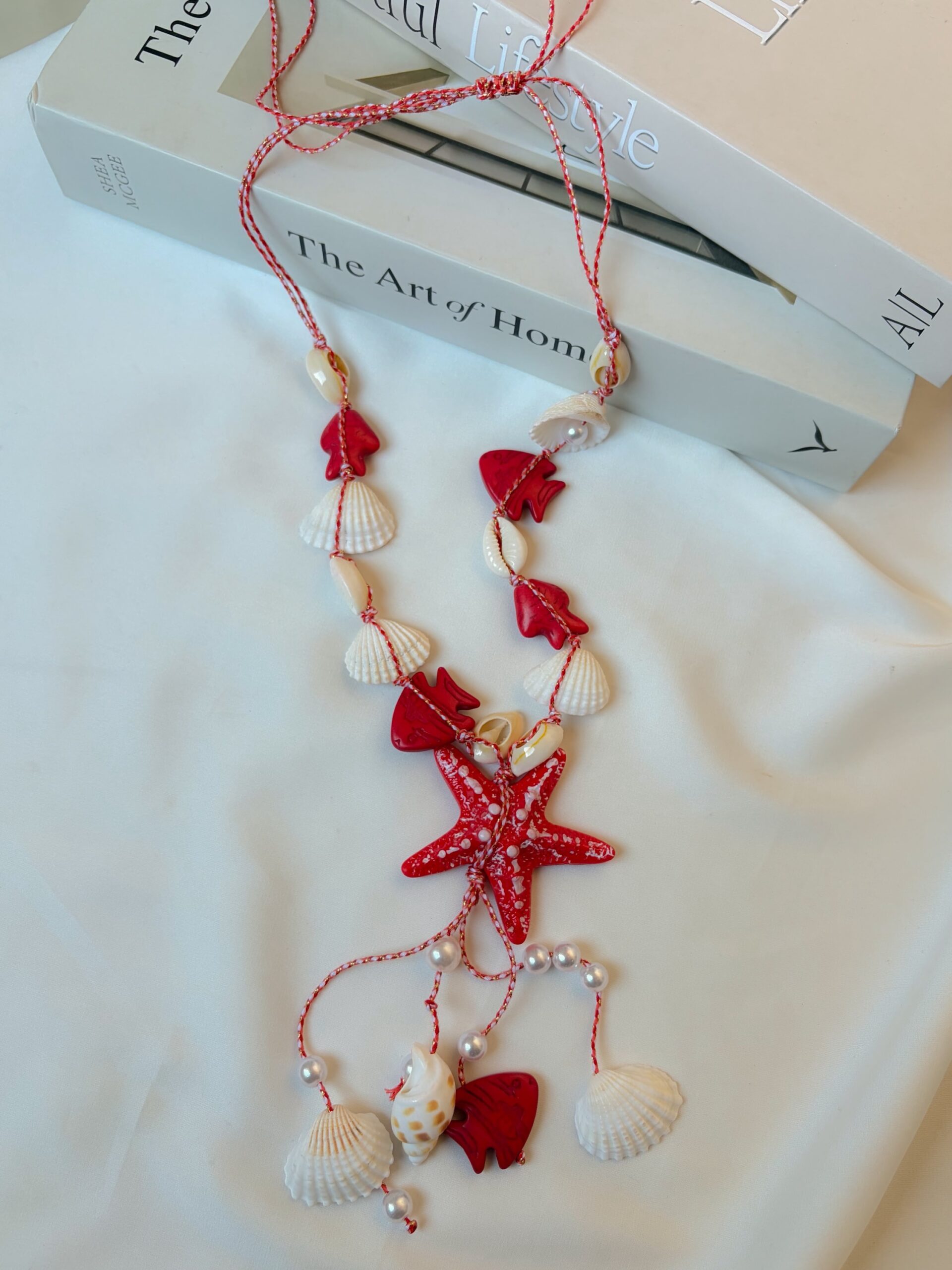 24cf81ab-4489-4ef2-b1f2-1e3d3f29adb8 Red Star Necklace - الصورة 1