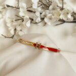 Hermes red bracelet